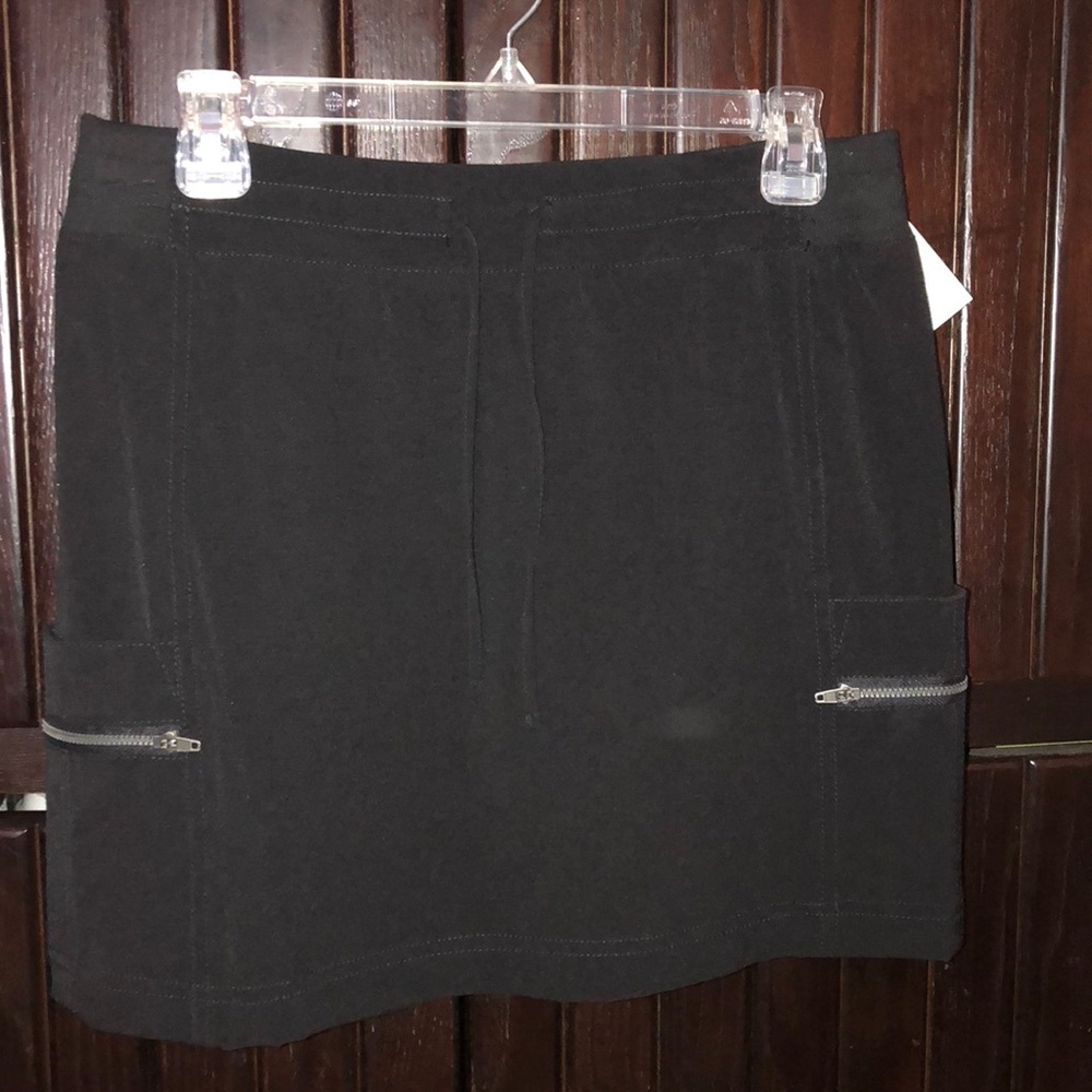 LADIES TANGERINE SKORT.                 NWT